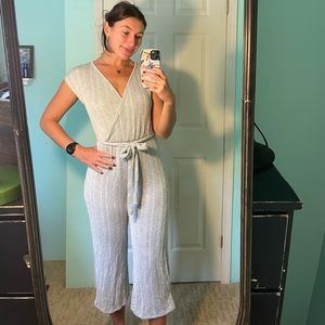 Striped jumpsuit with tags.